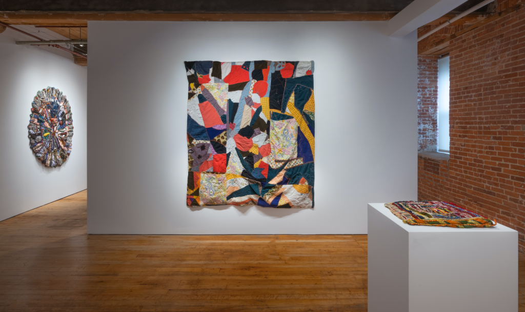 Installation view of Both Sides Now: The Spirituality, Resilience, and Innovation of Elizabeth Talford Scott at Goya Contemporary, Baltimore. Center: “Abstract #1” (1983), fabric, thread, 78 x 72 inches